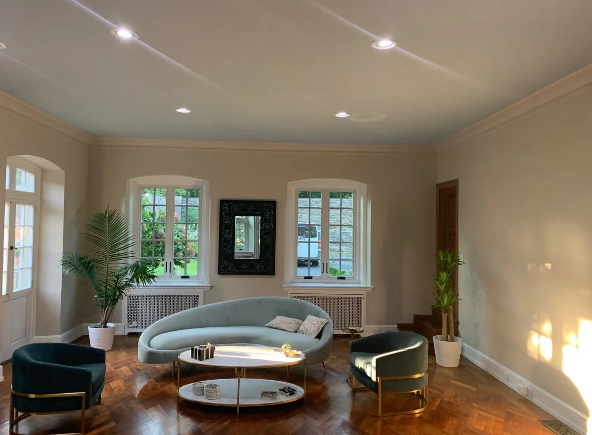 Finished period living room with restored trim and fresh paint